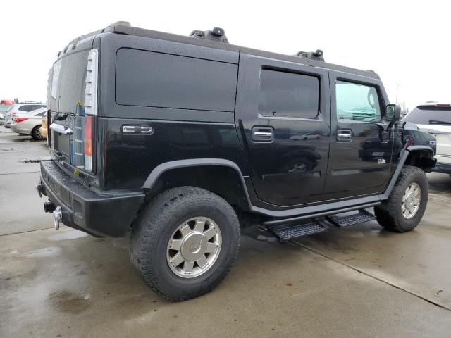 Photo 3 from auction – 2004 HUMMER H2 with VIN 5GRGN23U44H102353