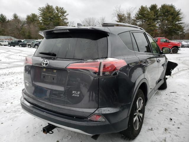 Photo 3 from auction – 2017 TOYOTA RAV4 XLE with VIN JTMRFREV7HJ707424