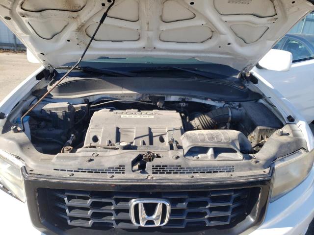 Photo 11 from auction – 2014 HONDA RIDGELINE with VIN 5FPYK1F60EB007545