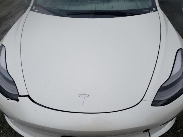 Photo 11 from auction – 2022 TESLA MODEL 3 with VIN 5YJ3E1EA0NF371299