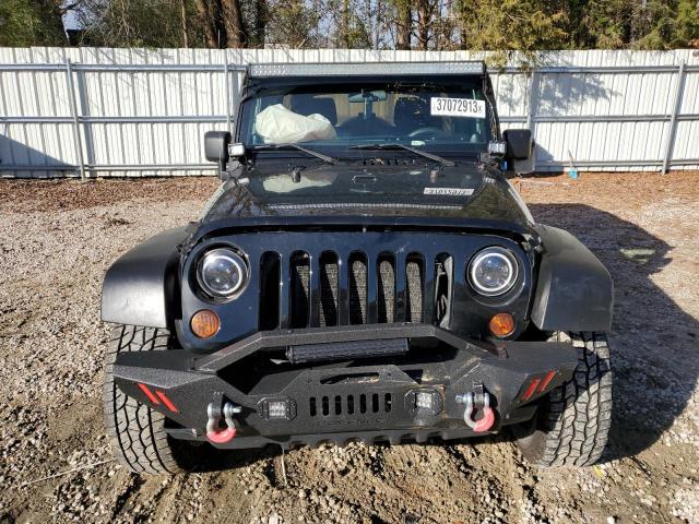 Photo 5 from auction – 2011 JEEP WRANGLER U with VIN 1J4BA3H13BL511072