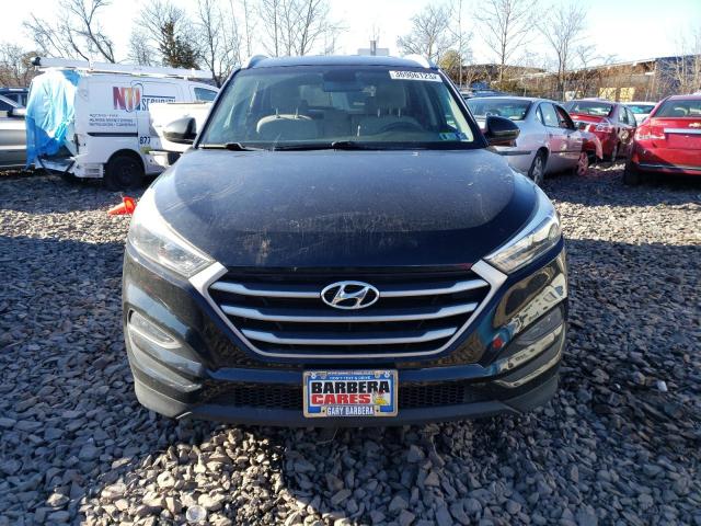 Photo 5 from auction – 2017 HYUNDAI TUCSON LIM with VIN KM8J3CA49HU303647