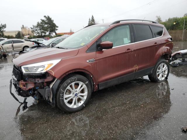FORD ESCAPE SE 2018 with VIN 1FMCU0GD7JUC09042 - Photo from auction