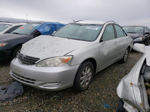 TOYOTA CAMRY LE 2002 with VIN JTDBF30K920015089 - Photo from auction