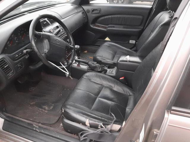 Photo 7 from auction – 1999 NISSAN MAXIMA GLE with VIN JN1CA21AXXT101006