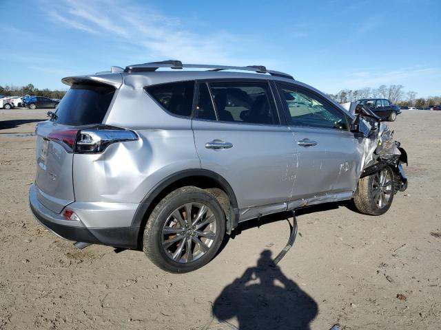 Photo 3 from auction – 2018 TOYOTA RAV4 LIMIT with VIN JTMDFREV7JD254999