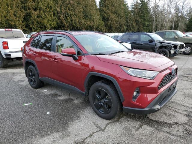 Photo 4 from auction – 2021 TOYOTA RAV4 XLE with VIN JTMR6RFVXMD506107