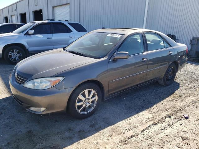 TOYOTA CAMRY LE 2004 with VIN 4T1BF30K54U584495 - Photo from auction