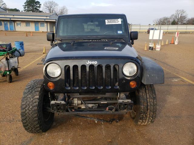 Photo 5 from auction – 2011 JEEP WRANGLER U with VIN 1J4BA6H13BL512711