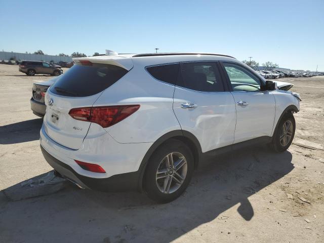 Photo 3 from auction – 2018 HYUNDAI SANTA FE S with VIN 5NMZU3LB9JH094892