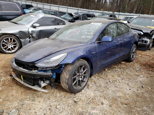 TESLA MODEL 3 2021 with VIN 5YJ3E1EA9MF991518 - Photo from auction