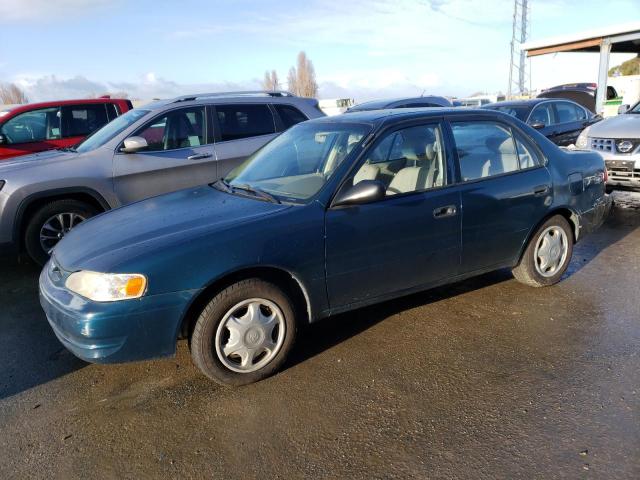 TOYOTA COROLLA VE 1998 with VIN 1NXBR12E8WZ123636 - Photo from auction
