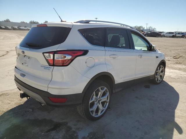 Photo 3 from auction – 2017 FORD ESCAPE TIT with VIN 1FMCU0J98HUD91137