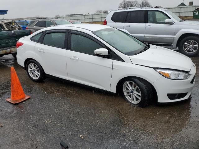 Photo 4 from auction – 2016 FORD FOCUS SE with VIN 1FADP3F28GL383594