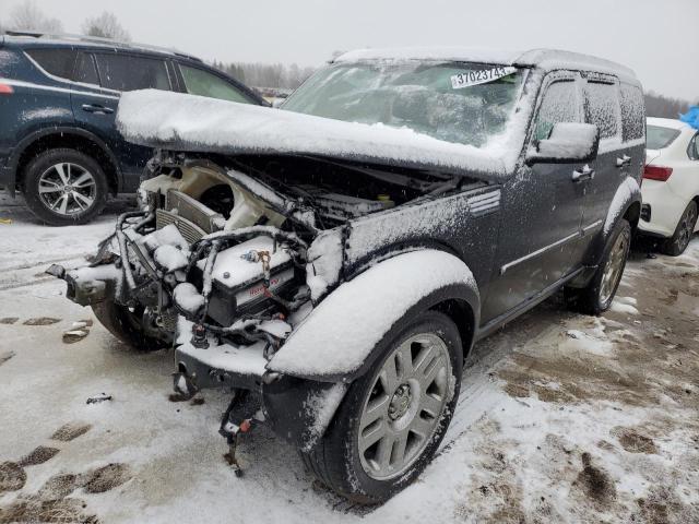 DODGE NITRO HEAT 2011 with VIN 1D4PU4GXXBW607538 - Photo from auction