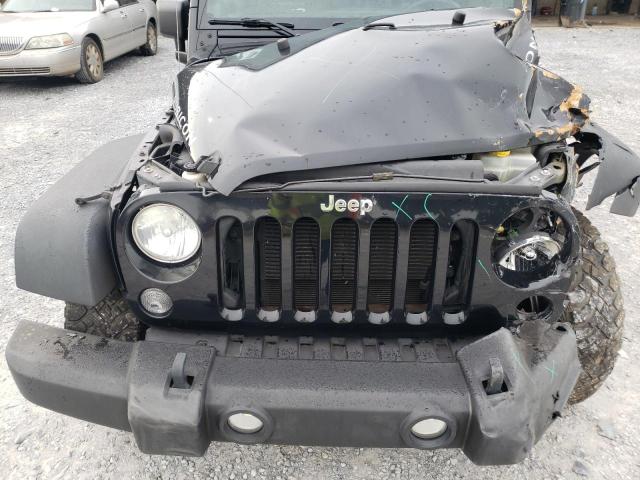 Photo 11 from auction – 2014 JEEP WRANGLER U with VIN 1C4BJWFG3EL201183