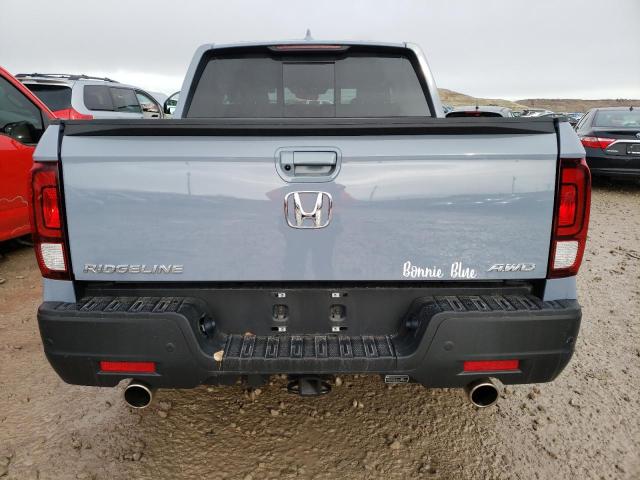 Photo 6 from auction – 2022 HONDA RIDGELINE with VIN 5FPYK3F77NB012584