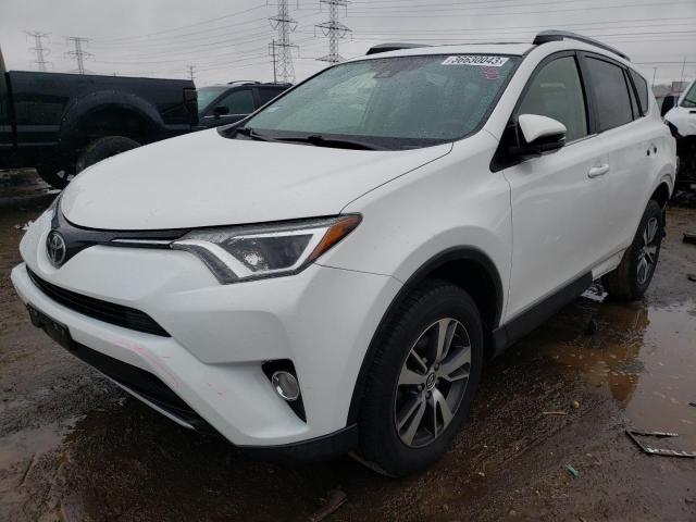 TOYOTA RAV4 XLE 2017 with VIN JTMRFREV5HD221483 - Photo from auction
