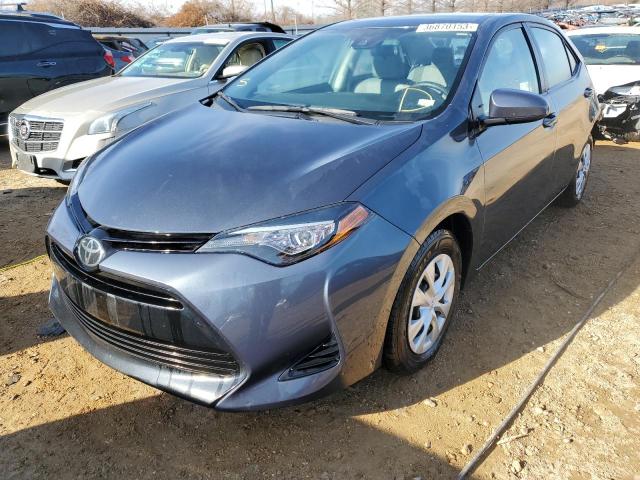 TOYOTA COROLLA LE 2017 with VIN 2T1BPRHE1HC864971 - Photo from auction