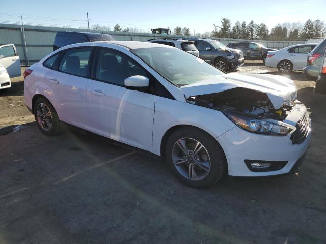 Foto 4 de la subasta – 2018 FORD FOCUS SE con VIN 1FADP3FE1JL264691