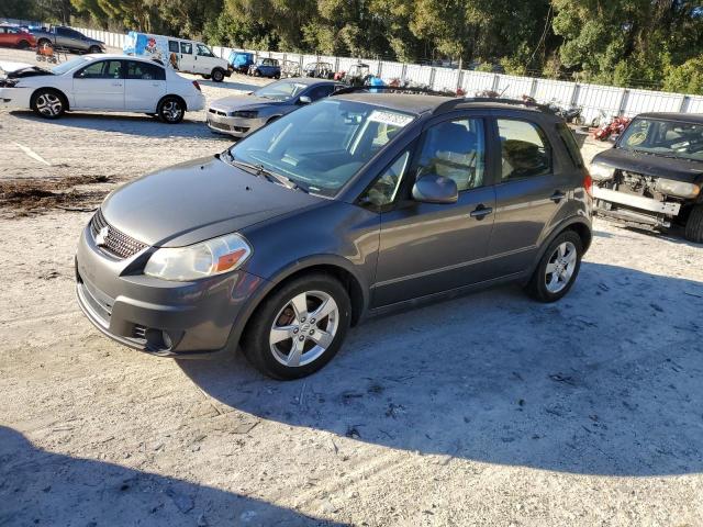 SUZUKI SX4 2012 with VIN JS2YB5A38C6300556 - Photo from auction