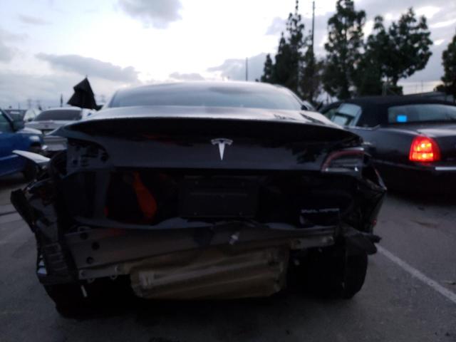 Photo 6 from auction – 2019 TESLA MODEL 3 with VIN 5YJ3E1EB1KF199188