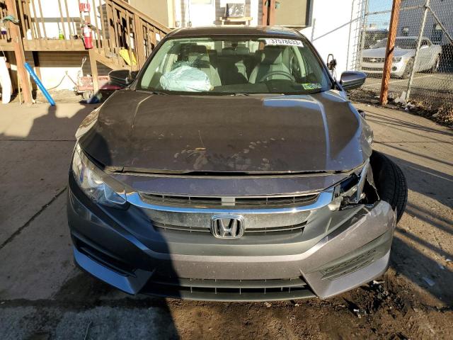 Photo 5 from auction – 2018 HONDA CIVIC EX with VIN 2HGFC2F70JH513040