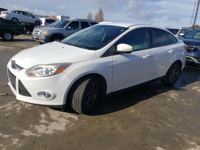 FORD FOCUS SE 2013 with VIN 1FADP3F22DL277699 - Photo from auction