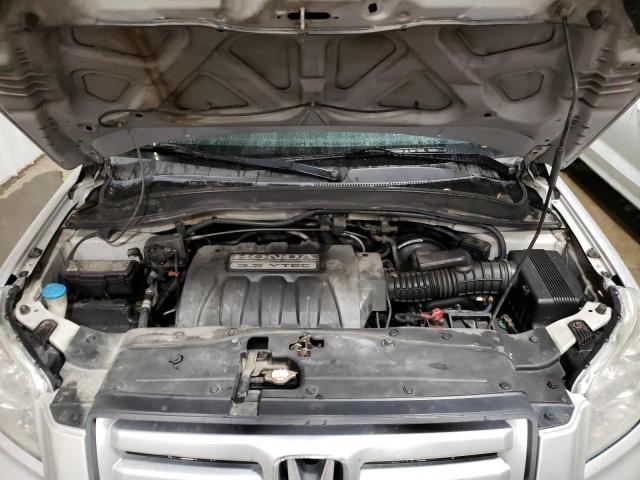 Photo 11 from auction – 2006 HONDA PILOT EX with VIN 2HKYF18596H544516