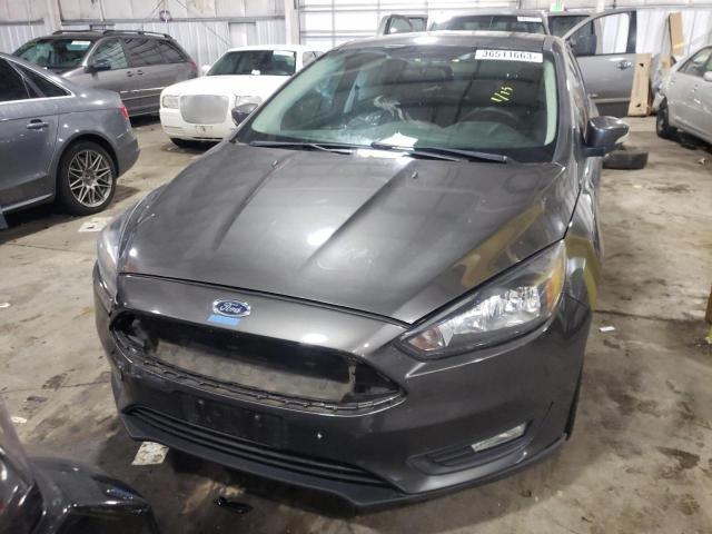 Photo 5 from auction – 2016 FORD FOCUS SE with VIN 1FADP3F24GL213197