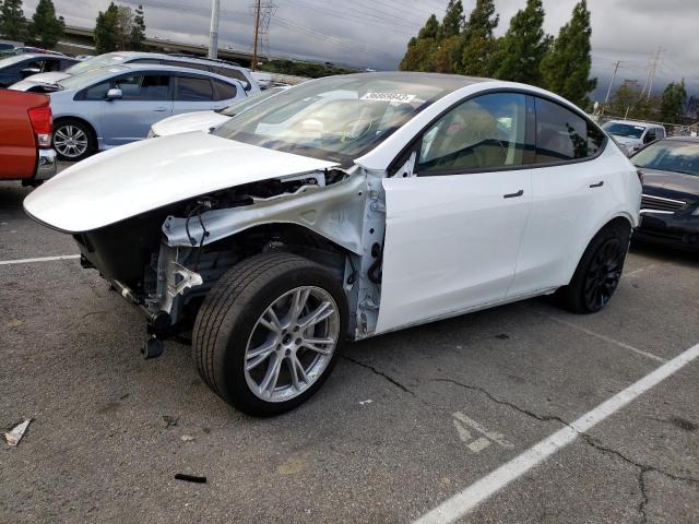 TESLA MODEL Y 2021 مع رقم تعريف المركبة 5YJYGDEEXMF273691 - صورة من المزاد
