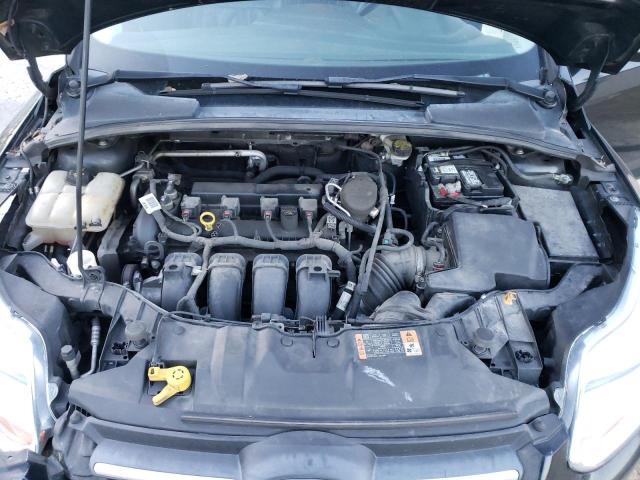 Photo 11 from auction – 2014 FORD FOCUS SE with VIN 1FADP3K29EL422860