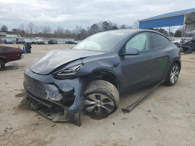 TESLA MODEL Y 2022 with VIN 7SAYGDEE2NF308227 - Photo from auction