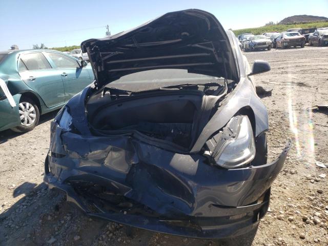 Photo 5 from auction – 2022 TESLA MODEL 3 with VIN 5YJ3E1EC0NF318362