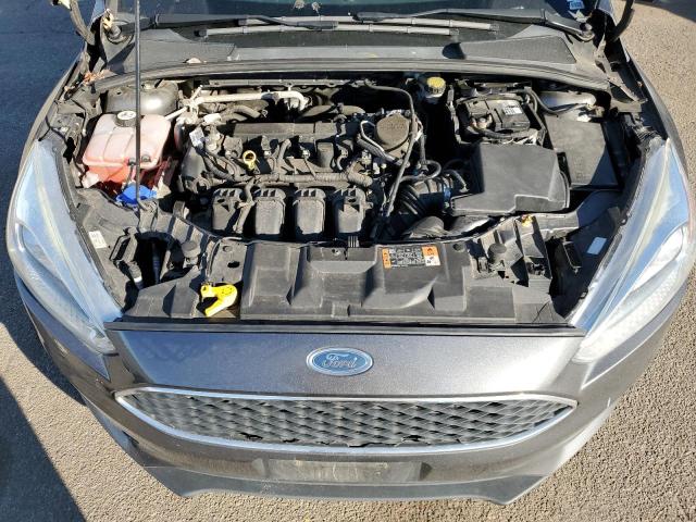 Photo 11 from auction – 2015 FORD FOCUS SE with VIN 1FADP3K23FL315711
