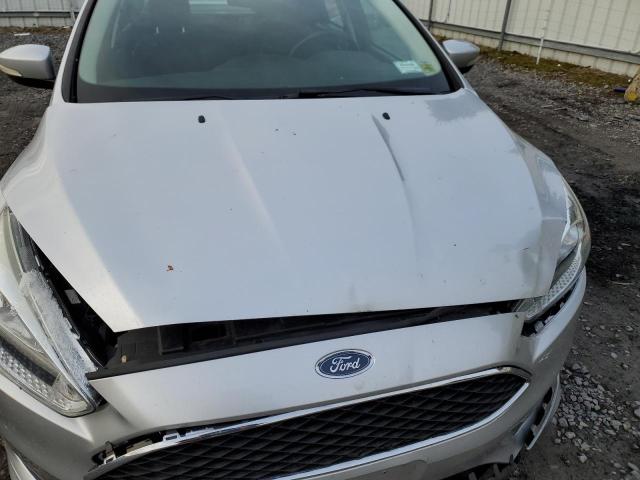 Photo 11 from auction – 2015 FORD FOCUS SE with VIN 1FADP3F28FL353283