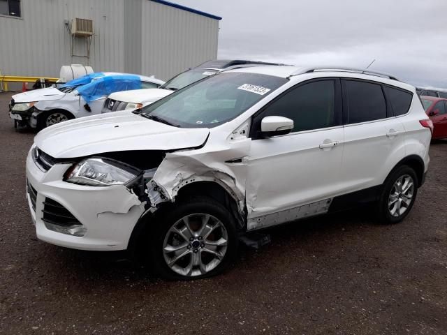 FORD ESCAPE TIT 2016 with VIN 1FMCU0J92GUA70077 - Photo from auction