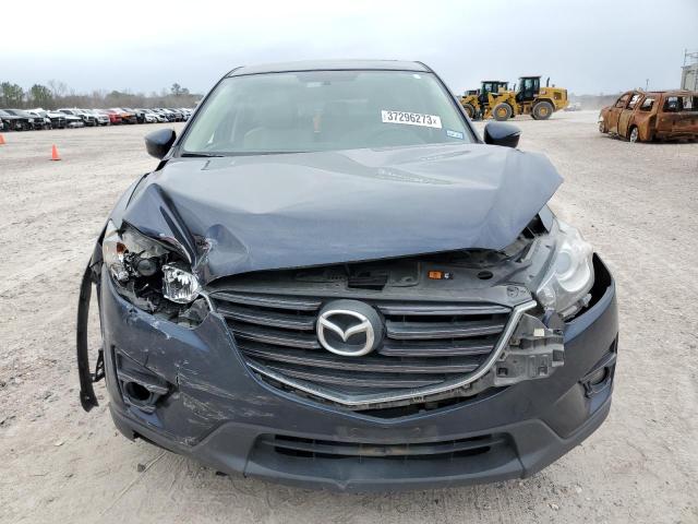 Photo 5 from auction – 2016 MAZDA CX-5 TOURI with VIN JM3KE2CY2G0821786
