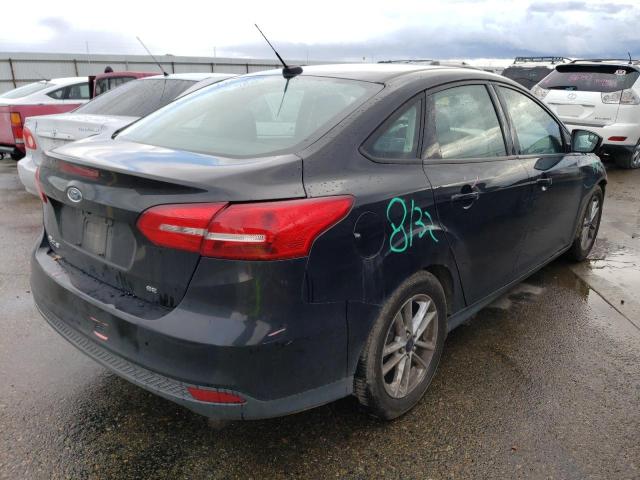 Photo 3 from auction – 2015 FORD FOCUS SE with VIN 1FADP3F23FL207163