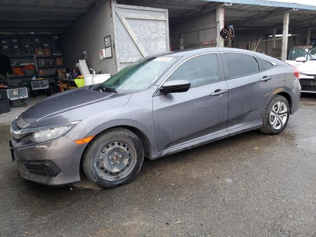 HONDA CIVIC LX 2017 with VIN 2HGFC2F5XHH556566 - Photo from auction