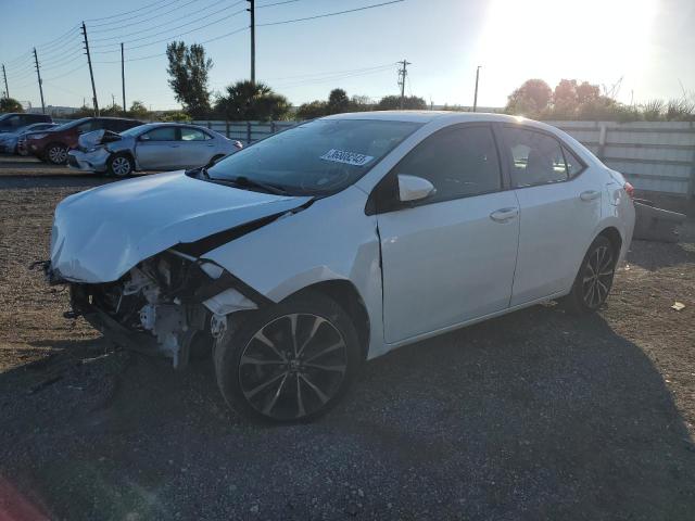 TOYOTA COROLLA L 2017 with VIN 5YFBURHE3HP622210 - Photo from auction