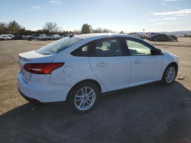 Photo 3 from auction – 2015 FORD FOCUS SE with VIN 1FADP3F28FL200550