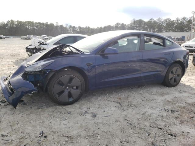 TESLA MODEL 3 2022 with VIN 5YJ3E1EAXNF184748 - Photo from auction