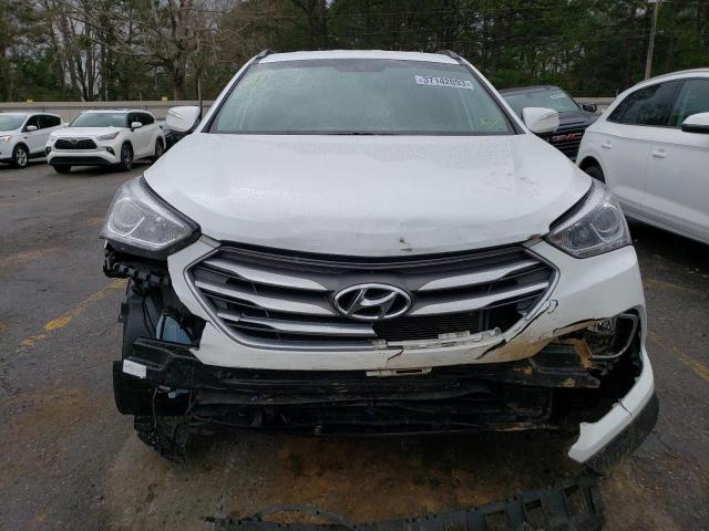 Photo 5 from auction – 2018 HYUNDAI SANTA FE S with VIN 5NMZU3LB7JH085091