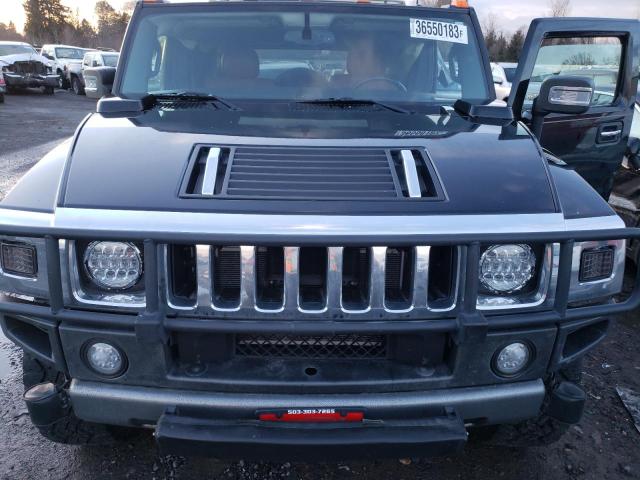 Photo 12 from auction – 2008 HUMMER H2 with VIN 5GRGN23838H100523