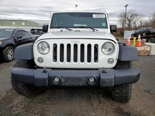 Photo 5 from auction – 2014 JEEP WRANGLER U with VIN 1C4BJWDG8EL136723