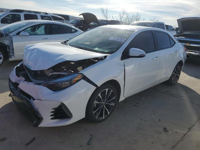 TOYOTA COROLLA L 2019 with VIN 5YFBURHE9KP894400 - Photo from auction
