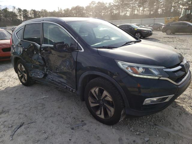Photo 4 from auction – 2016 HONDA CR-V TOURI with VIN 5J6RM3H94GL032114