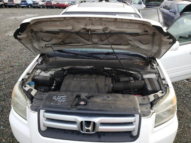 Photo 12 from auction – 2006 HONDA PILOT EX with VIN 2HKYF18586H565017