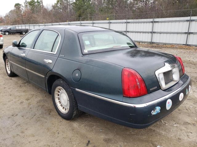 Photo 2 from auction – 2002 LINCOLN TOWN CAR E with VIN 1LNHM81W82Y609636